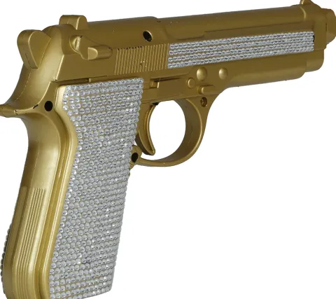 Pistol i guld-glitter